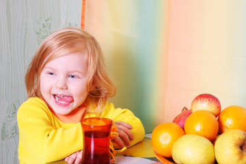 little girl with fruit
