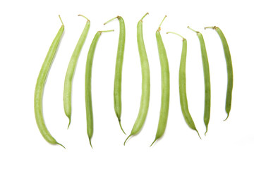 green beans on a white background. - obrazy, fototapety, plakaty
