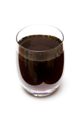 Glass of cola on a white background.