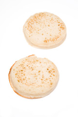 Crumpets on a white background
