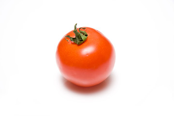 Red tomato isolated on a white background.