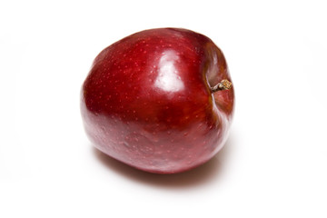 Red apple on a white background.