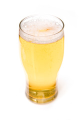 Pint of beer isolated on a white background.