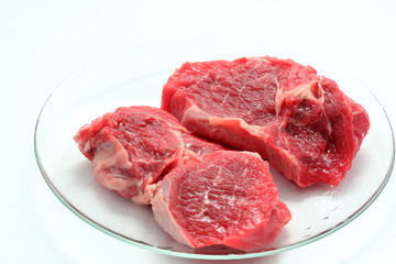 raw meat on white