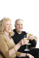 Older couple going over the damage the stock market crash has ha