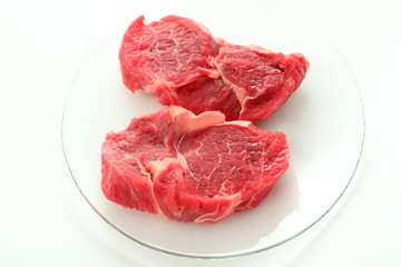 raw meat on white