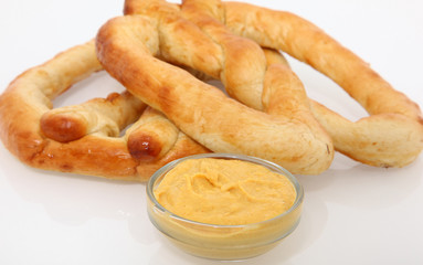 Hot no salt soft pretzels with mustard.