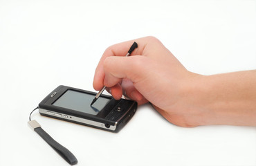 Man's hand with pocket PC isolated