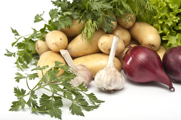 potatoes and fresh greens, garlic and onion