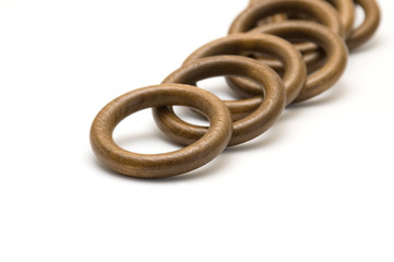 Fototapeta premium Wooden rings on a white background
