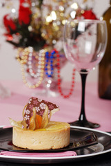 lemon tart decorated on pink and black