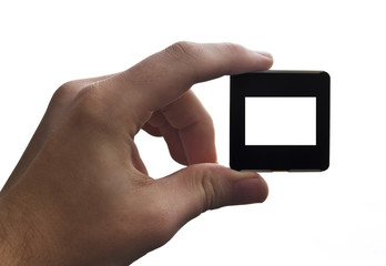 Hand hält Diarahmen