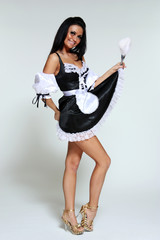 Sexy female go-go dancer in professional outfit