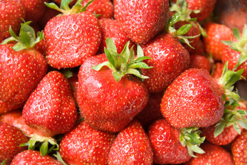 Fototapeta na wymiar Background with tasty sweet strawberries