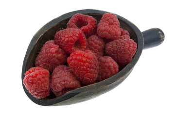 scoop of fresh red raspberries