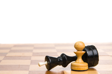 Two chessmen on a chessboard, white background