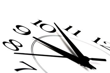 white clock showing time about nine isolated