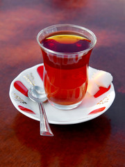 A glass of tea. Well steeped