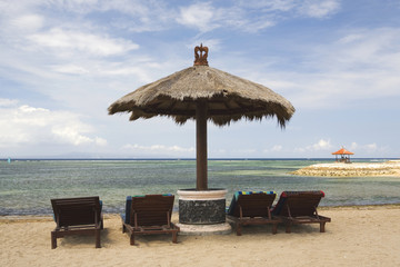 Gazebo and umbrella at beautiful Bali Beach