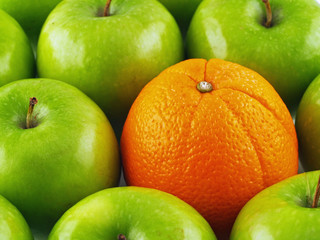 Green Apples and Orange Background