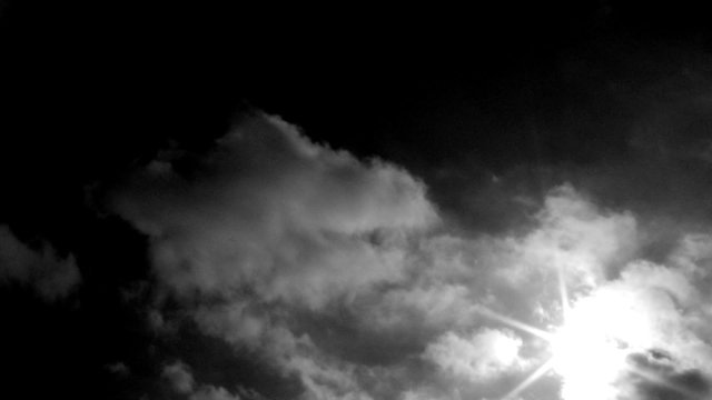 Black and White Clouds and Sun