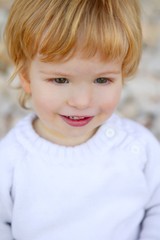 boy portrait winter outdoor, stones background