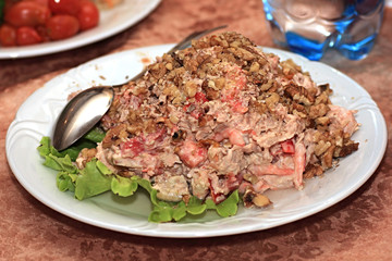 Salad from shrimps with nuts.