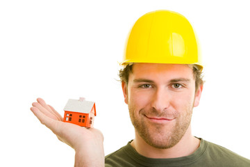 Bauarbeiter mit Haus