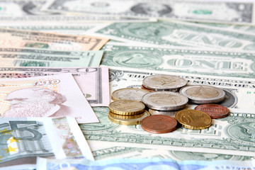 Money. World currencies: U.S. dollars, pounds and euros.