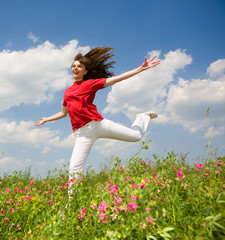 Happy young woman jumping