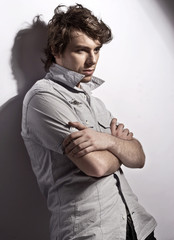 young, handsome man thinking