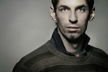 Obraz premium Attractive handsome young man, nostalgic , calm look.