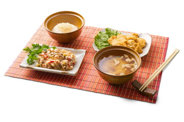 Asian business lunch with rice, miso soup, tempura, gedze
