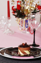 chocolate truffle cake with pink and black