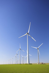 Windmills in Holland producing clean energy - 12819630