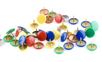 Colorful pins on white background
