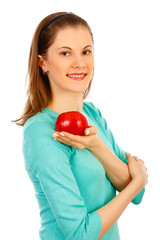 Beautiful girl with an apple. Isolated on white