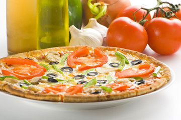 homemade pizza with fresh tomato olive mushroom cheese