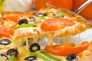 homemade pizza with fresh tomato olive mushroom cheese