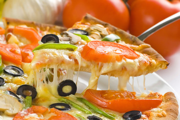 homemade pizza with fresh tomato olive mushroom cheese