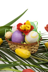 Easter decoration with eggs,chicken and tulips