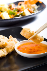 eating deep fried calamari