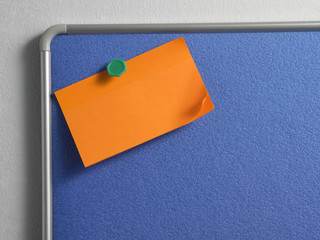 adhesive note on the notice board