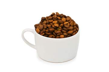 Cup and coffee beans isolated on the white