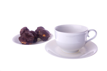 white cup and cakes