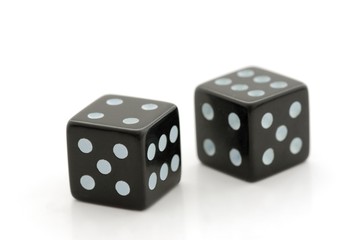 pair of black dices isolated on white