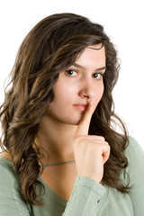 Beautiful woman making silence sign