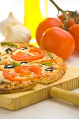 homemade pizza with fresh tomato olive mushroom cheese