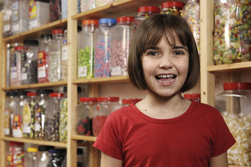 child in sweet shop