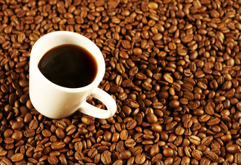 white cup of coffee in the background